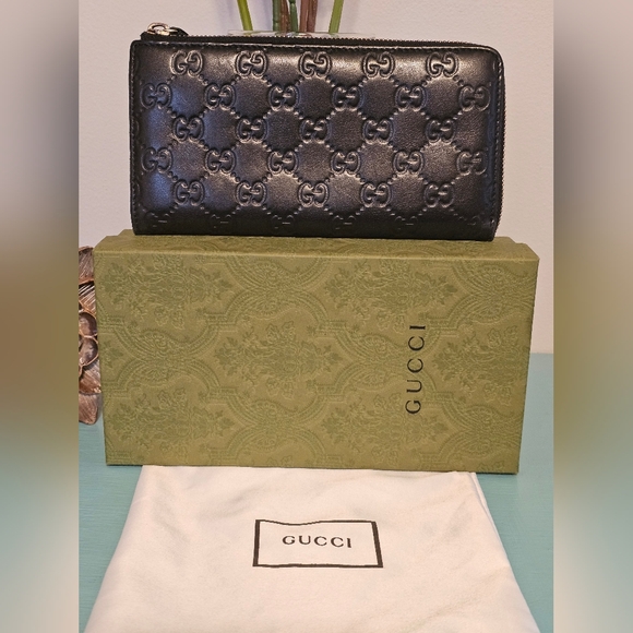 Gucci Handbags - Gucci Guccissima Black Leather Zip Long Wallet